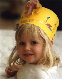 Lizzie in her party hat