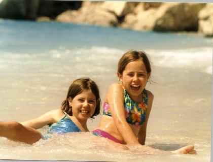 Kate and Joanne are hit by a wave